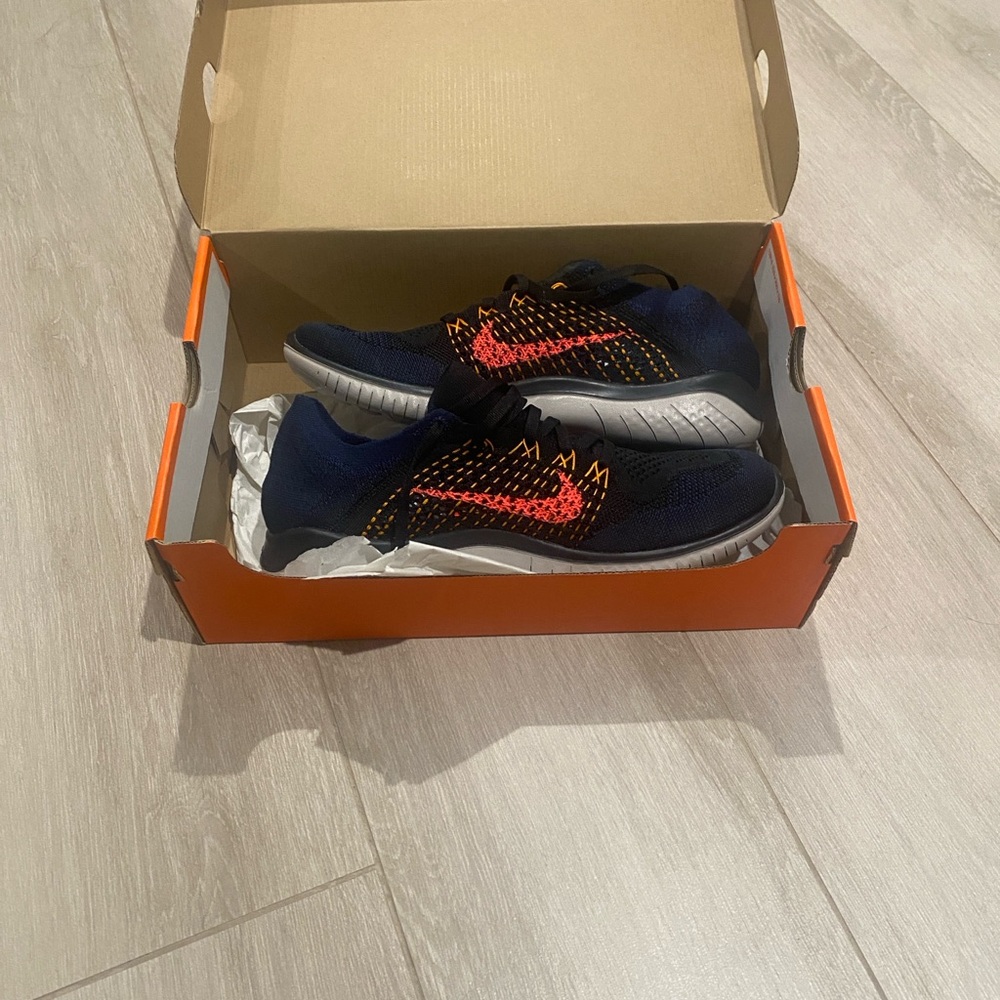 Nike Men’s Sneakers in Black / Flash Crimson